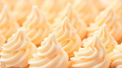 Close-up of fluffy frosted cupcakes, perfect for celebrating a sweet occasion