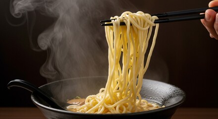 Steaming Ramen Noodles Lifted with Chopsticks, Dark Bowl, Culinary Delight