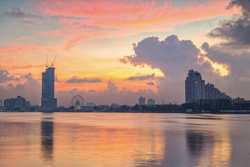Landscape view of the residential and business district in Bangkok. Ferris wheel is an important...