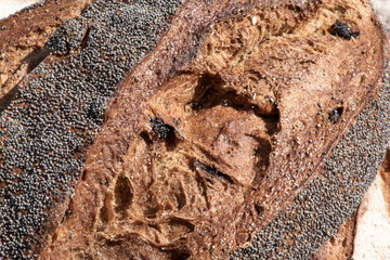 loaf of rye bread with seeds