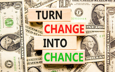 Turn change into chance symbol. Concept words phrase Turn change into chance on beautiful blocks....