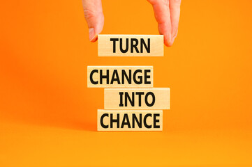 Turn change into chance symbol. Concept words phrase Turn change into chance on beautiful wooden...
