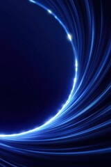 Abstract blue light trails creating dynamic curved patterns on a dark background