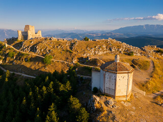 Italy, July 5, 2025: Ruins of Rocca Calascio Castle, an Italian tourist destination and landmark in the Gran Sasso National Park, L'Aquila, Abruzzo. Clear blue skies at sunset.