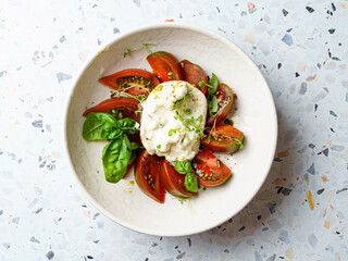 burrata with tomatoes, basil and pesto