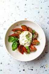 burrata with tomatoes, basil and pesto