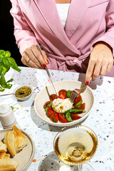 burrata with tomatoes, basil and pesto