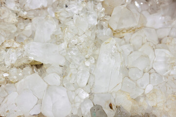 The mineral is milky-white quartz. Geology and Mineralogy