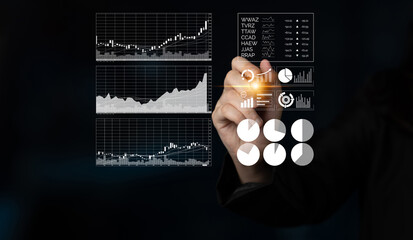 A professional hand interacts with futuristic digital financial visualizations, showcasing graphs, charts, and data analysis in a dark environment, emphasizing technology in finance. Impute