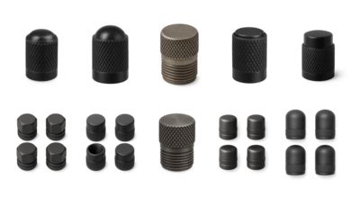 Collection of tire valve caps in assorted shapes and textures including knurled, hex, dome, and flat designs; tire valve cap ensures seal and dust protection for car, bike, and motorcycle valve stems