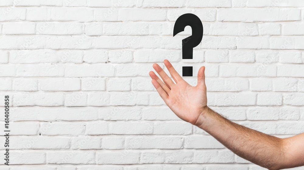 Aufkleber hand reaching out toward a blank wall with a question mark symbolizing uncertainty, curiosity, and t