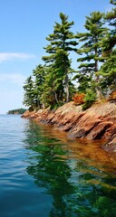 Lakeside pines reflected in clear water