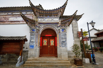 Fototapeta premium Traditional chinese house entrance gate in Yunnan Ethnical village in Kunming city China
