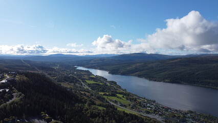 Naklejka premium Aerial View of Åresjön and the Surrounding Mountains in Åre, Sweden