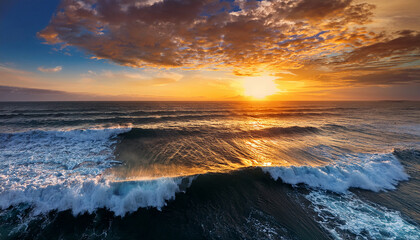 dramatic ocean waves rise under a vibrant sunset sky with golden clouds on the horizon