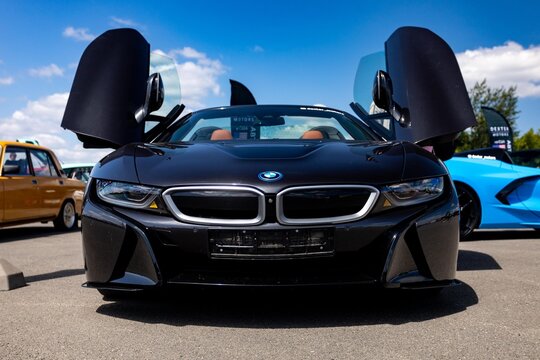 car on the road BMW i8 detail logo