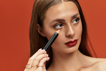 Creating a flawless look with makeup under warm studio lighting