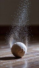 slow motion of medicine ball hitting the floor with dust particles rising