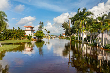 Naklejka premium Flooded residential area with underwater houses from hurricane Milton rainfall water in Punta Gorda, Florida. Aftermath of natural disaster in southern USA