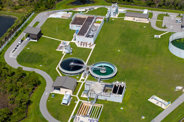 Industrial water treatment facility with water cleaning cisterns and piping system