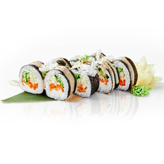 Delicious vegan sushi rolls with vegetables and cream cheese resting on a bamboo leaf