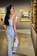 women in the museum looks at art exhibitions gallery