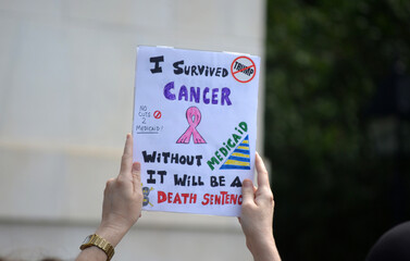 Sign at a rally celebrating Medicare and Medicaid.