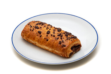 a white plate with a blue ring with a chocolate croissant on a white background