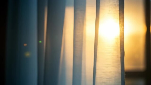 Sunlight streams through sheer curtains, creating a warm and inviting atmosphere in the room cinematic broll