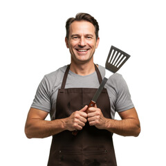 A happy chef is holding a spatula, ready to grill some delicious food.