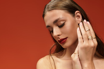 Obraz premium Celebration of beauty in warm tones with youthful elegance and radiant confidence