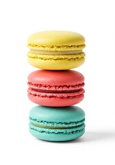 Stacked colorful macarons on a white background.