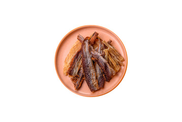 Dried salted fish as snacks or jerky, seafood as slices. Dried seafood snacks