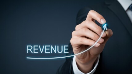 Businessman drawing revenue growth arrow, showing profit and financial success
