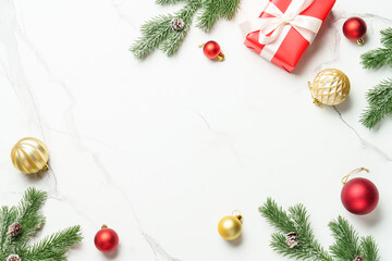 Christmas present with decor on white with space for design.