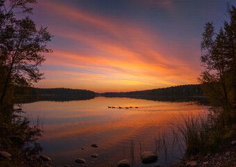 Obraz premium Sunset over lake