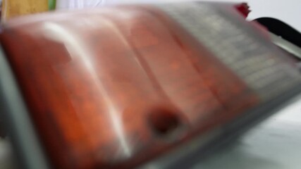 Accident with broken pickup truck turn signal and blinker light