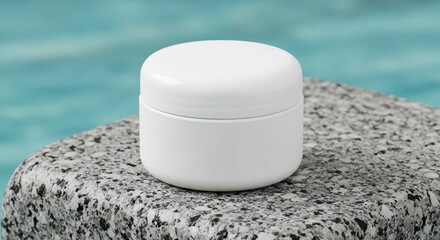 A white cosmetic container sits on a speckled stone surface with a blurred aqua background