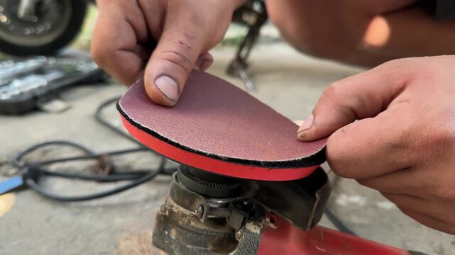 installing an emery wheel for grinding. High quality 4k footage