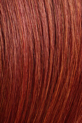 Fototapeta premium red hair, long glossy straight hair, macro hair texture