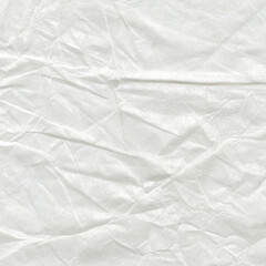 White crumpled paper texture with soft wrinkles and subtle folds, perfect for clean design backgrounds, stationery, scrapbooking, packaging, and creative textured projects.