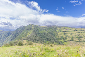 Naklejka premium Valley of the Chillos, Ecuador - June 9, 2025: Summit of Ilalo Volcano or where the Ilalo milestone is located, seen from the Ilalo Cross.