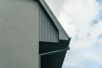 Modern architectural design of a residential building captured on a cloudy day in an urban setting