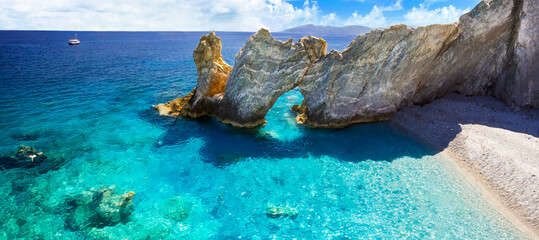 Best iconic beaches of Greece, Sporades - beautiful Lalaria beach with turquoise sea and arc rocks formation. Greek summer destinations.