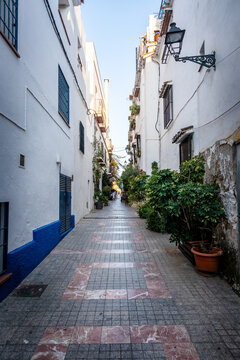 Fototapeta Marbella old town in Andalucia Spain. Typical Spanish village whitewashed houses narrow street 