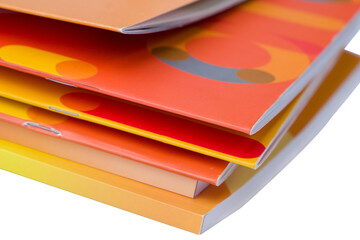 Stack of colorful magazine isolated on white background, clipping path 