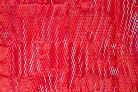 Red fabric texture background for design with copy space for text or image. - Powered by Adobe
