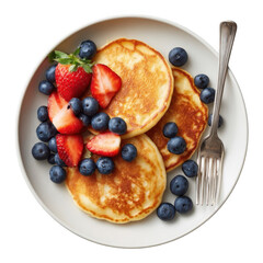 Delicious pancakes with fresh strawberries and blueberries isolated on transparent background