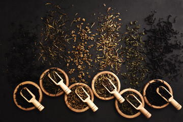 Colorful mix of tea varieties: red and black, green and white, oolong and herbal, selective focus,...