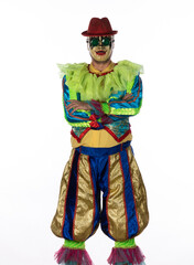 studio male portrait of evil clown on white background